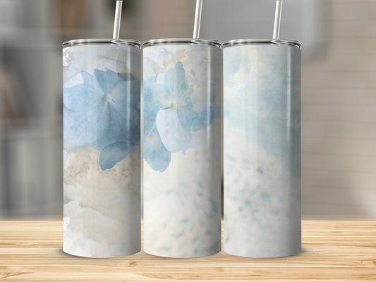 Three tumblers with watercolor blue hydrangeas and abstract splashes.
