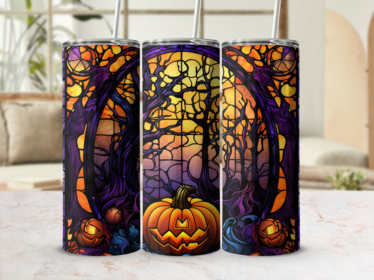 Stained glass tumbler with pumpkin and spooky tree design.