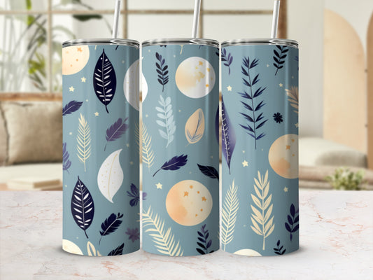 Three tumblers with a celestial moon and leaf pattern.