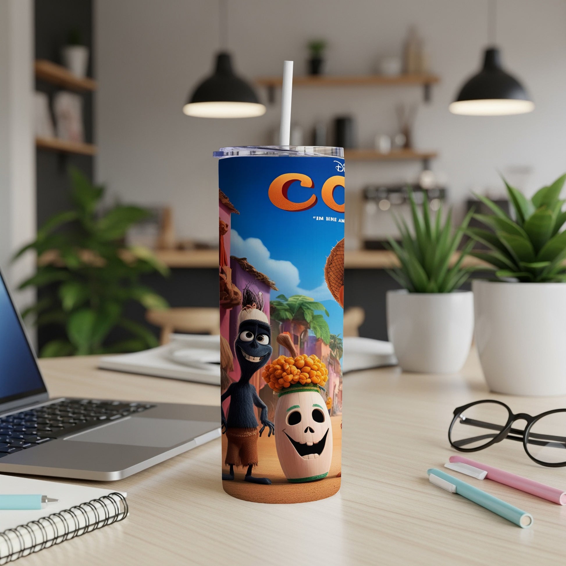 Animated character on a skinny tumbler cup with "Coco" logo.