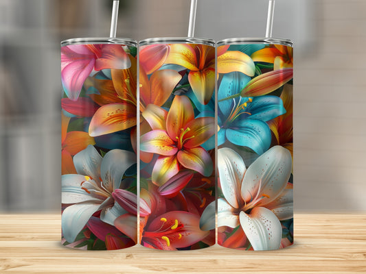 Three tumblers with colorful lily floral designs, standing on a wooden surface.