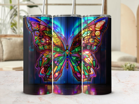 Colorful stained-glass butterfly design on three tumblers.