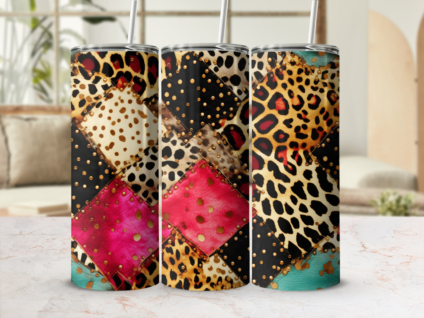 Three patterned tumblers with leopard, cheetah, and gold dot designs.