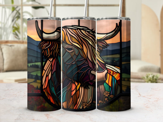 Colorful stained-glass style highland cow portrait on a tumbler, outdoor background.