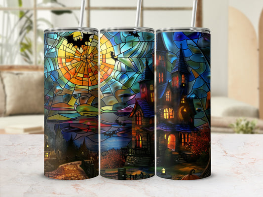 Stained glass tumblers with haunted houses and bats under a full moon.