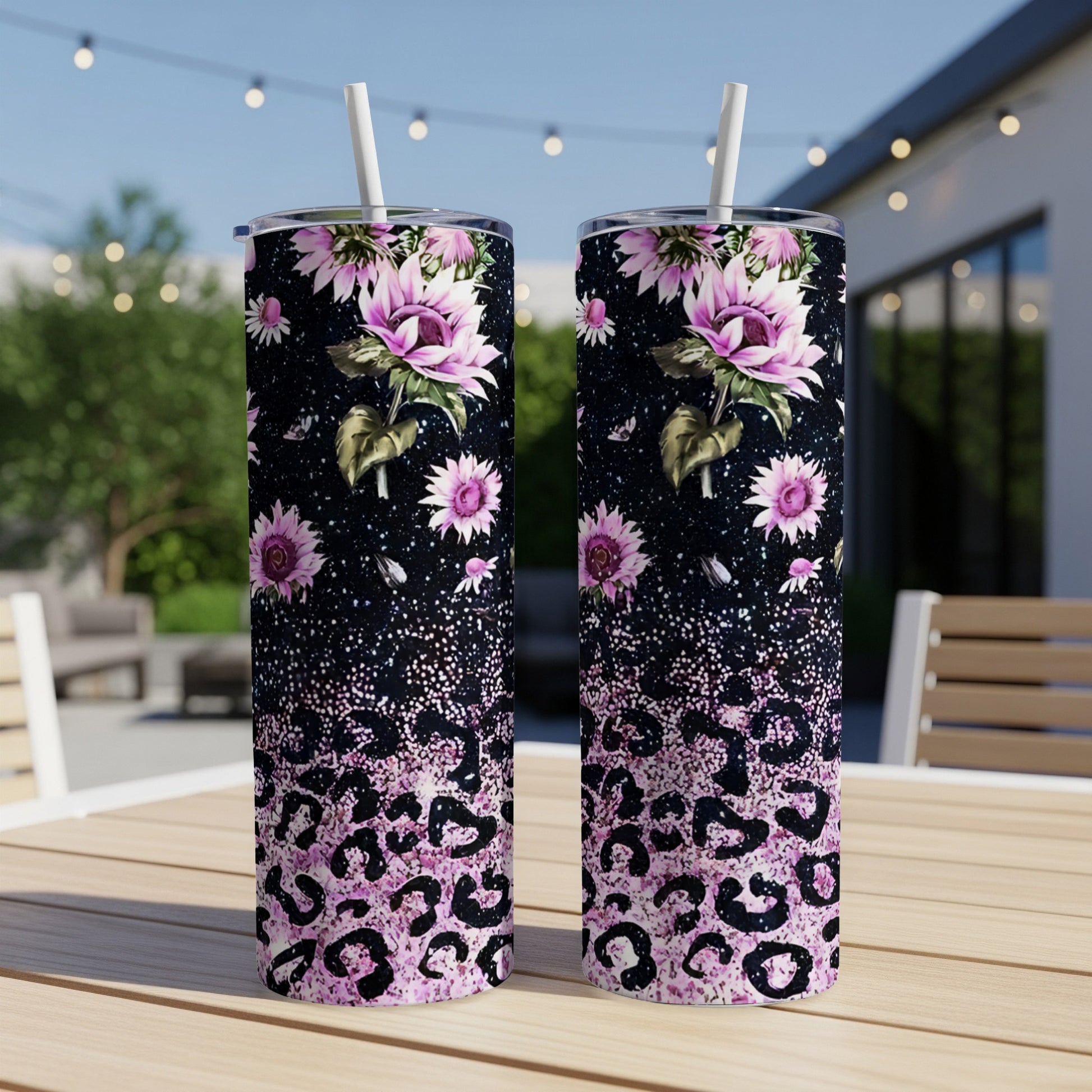 Two glittery tumblers with pink sunflowers and leopard print.