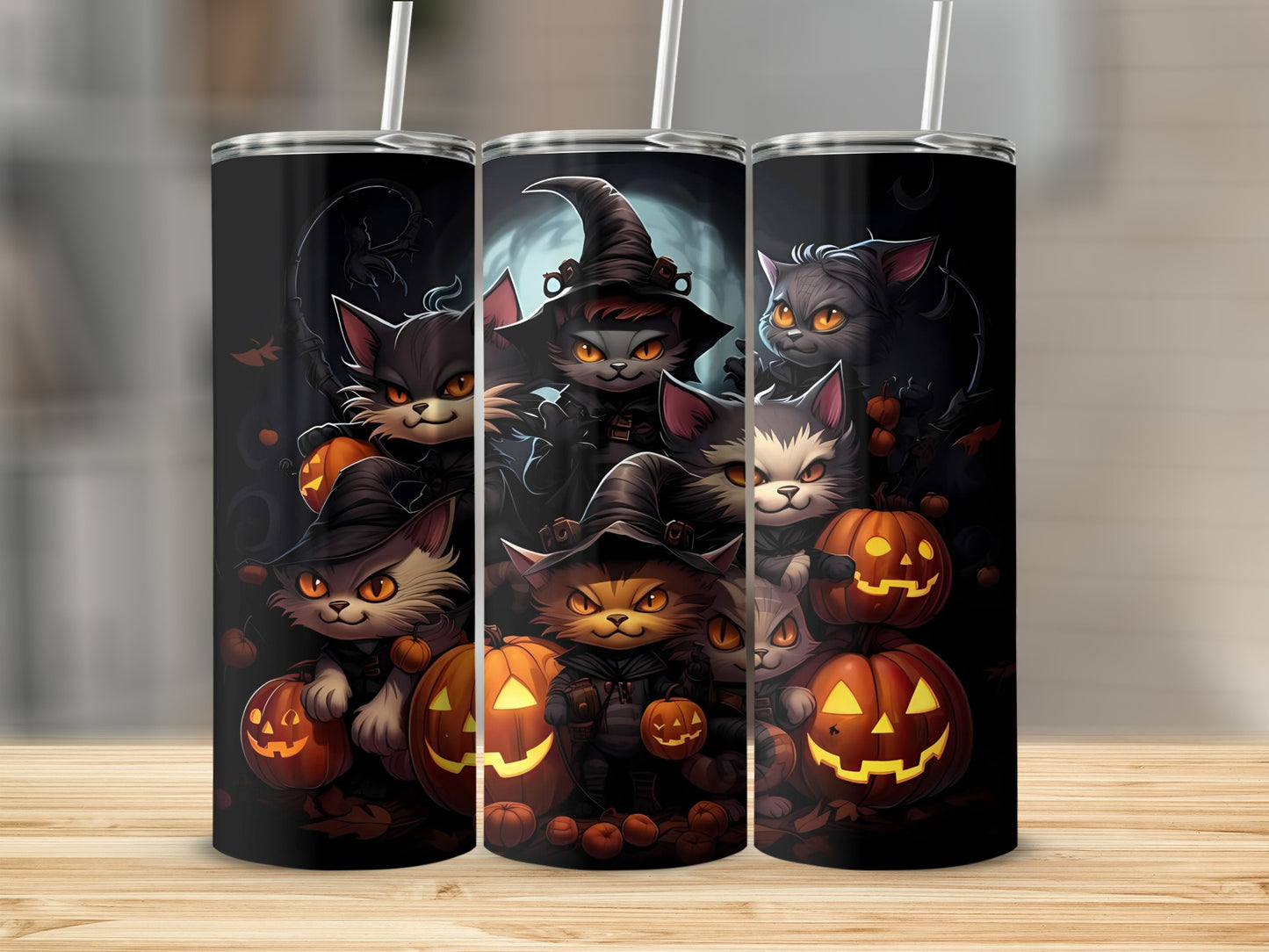Halloween cats and jack-o'-lanterns design on three tumblers with straws.