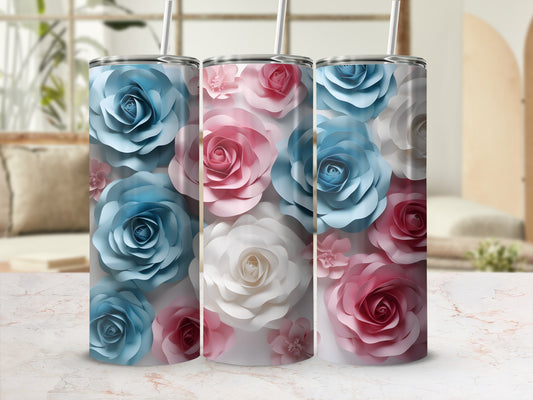 Three tumblers decorated with pink and blue paper roses.