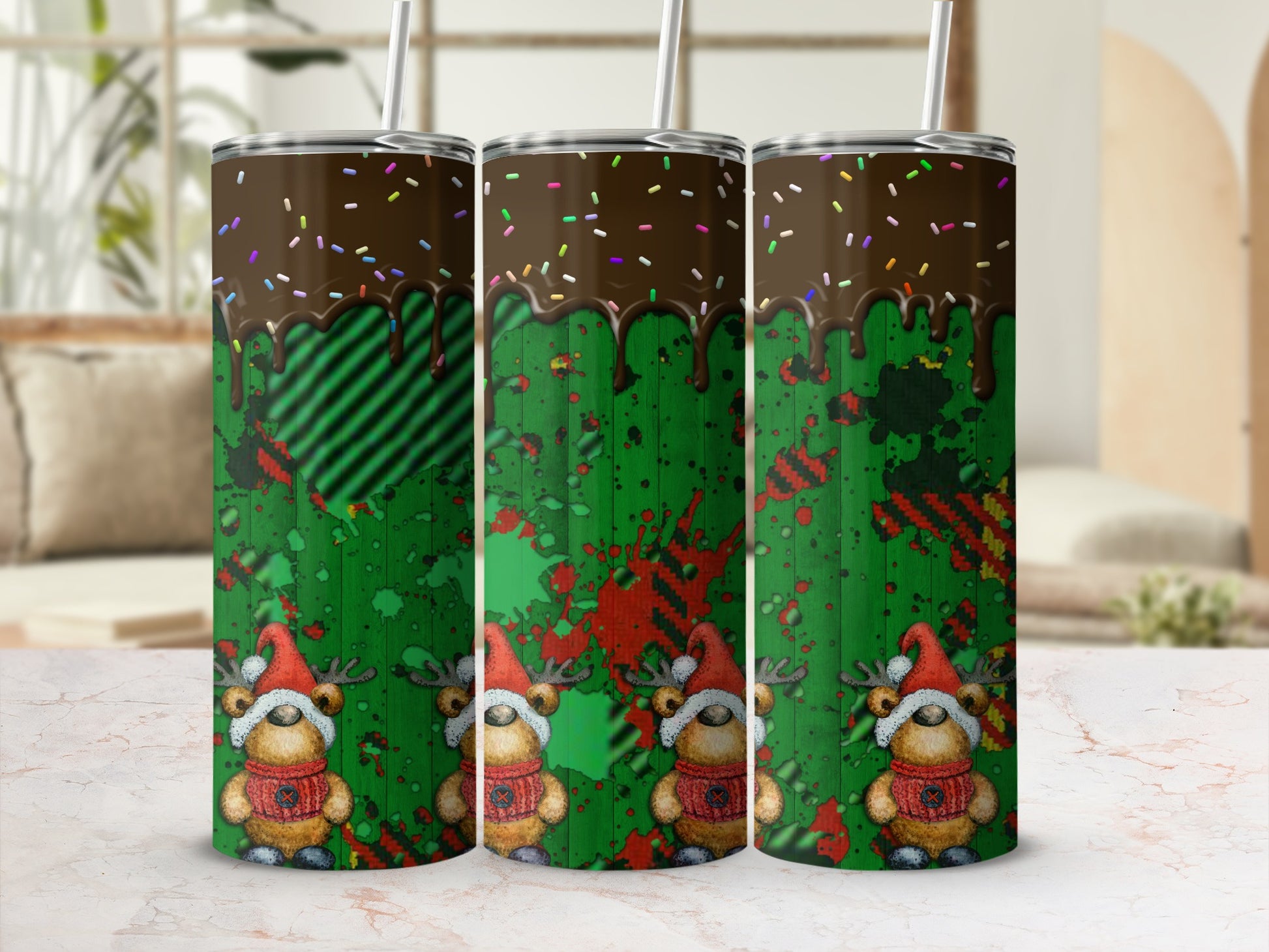 Three tumblers with chocolate drizzle, reindeer, and green plaid background.