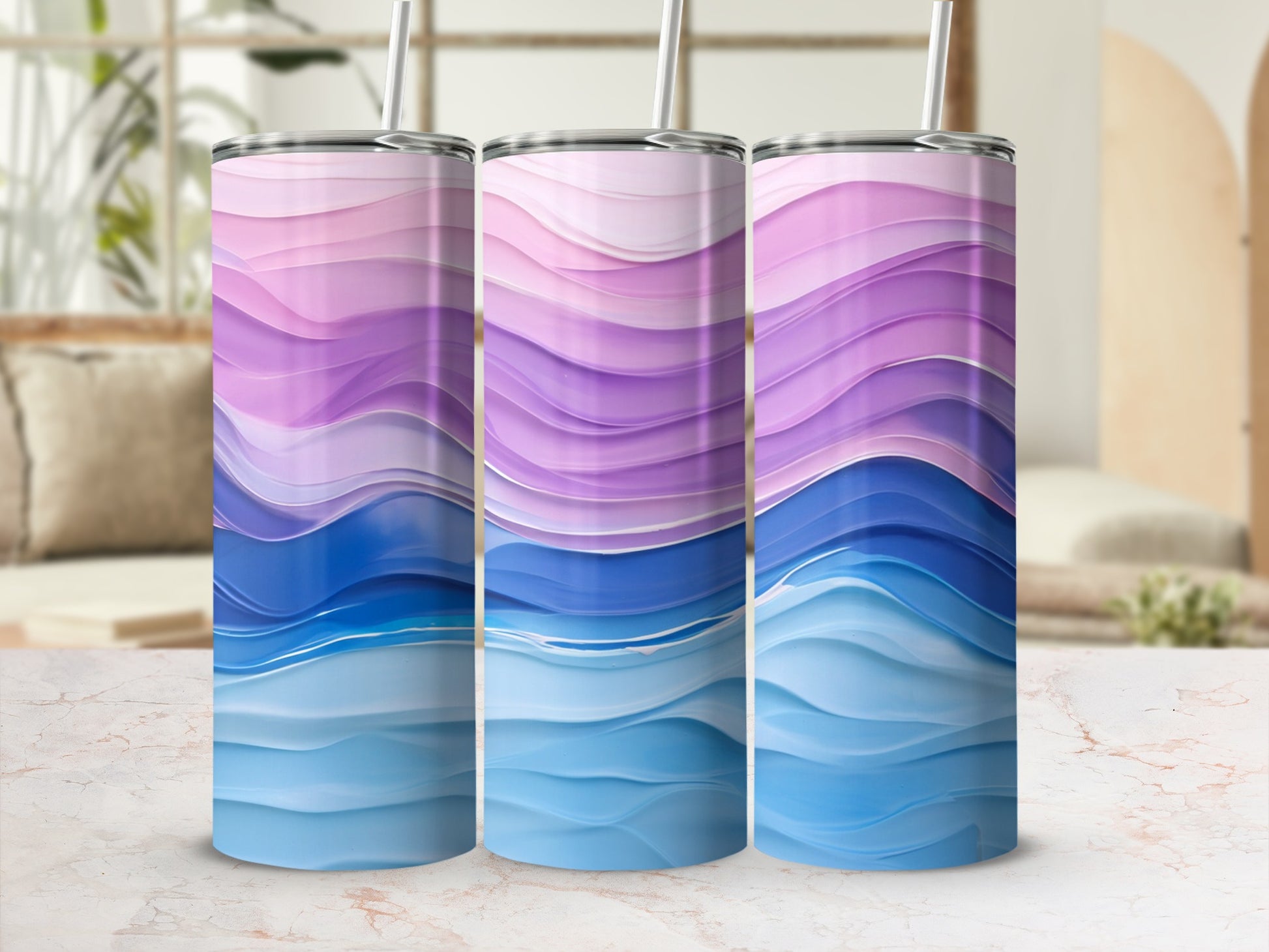 Three tumblers with flowing abstract wavy patterns in blue and purple.