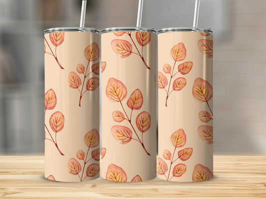Three tumblers with a light brown background and a repeating pattern of autumnal leaves on branches.