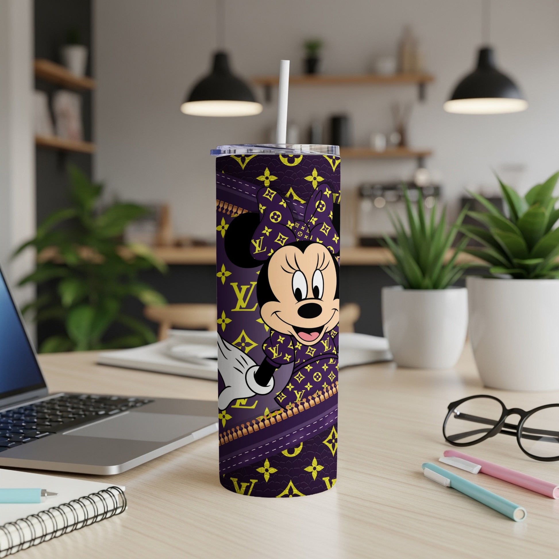 Minnie Mouse on a purple tumbler with a yellow LV pattern and zipper accents.