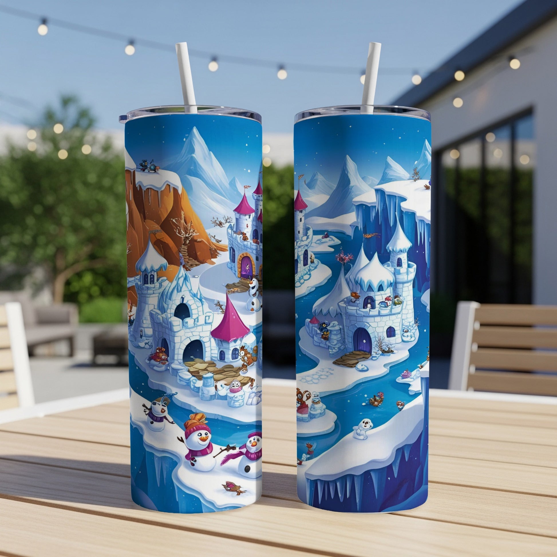 Two tumblers showing a whimsical winter castle scene with snowmen and penguins.