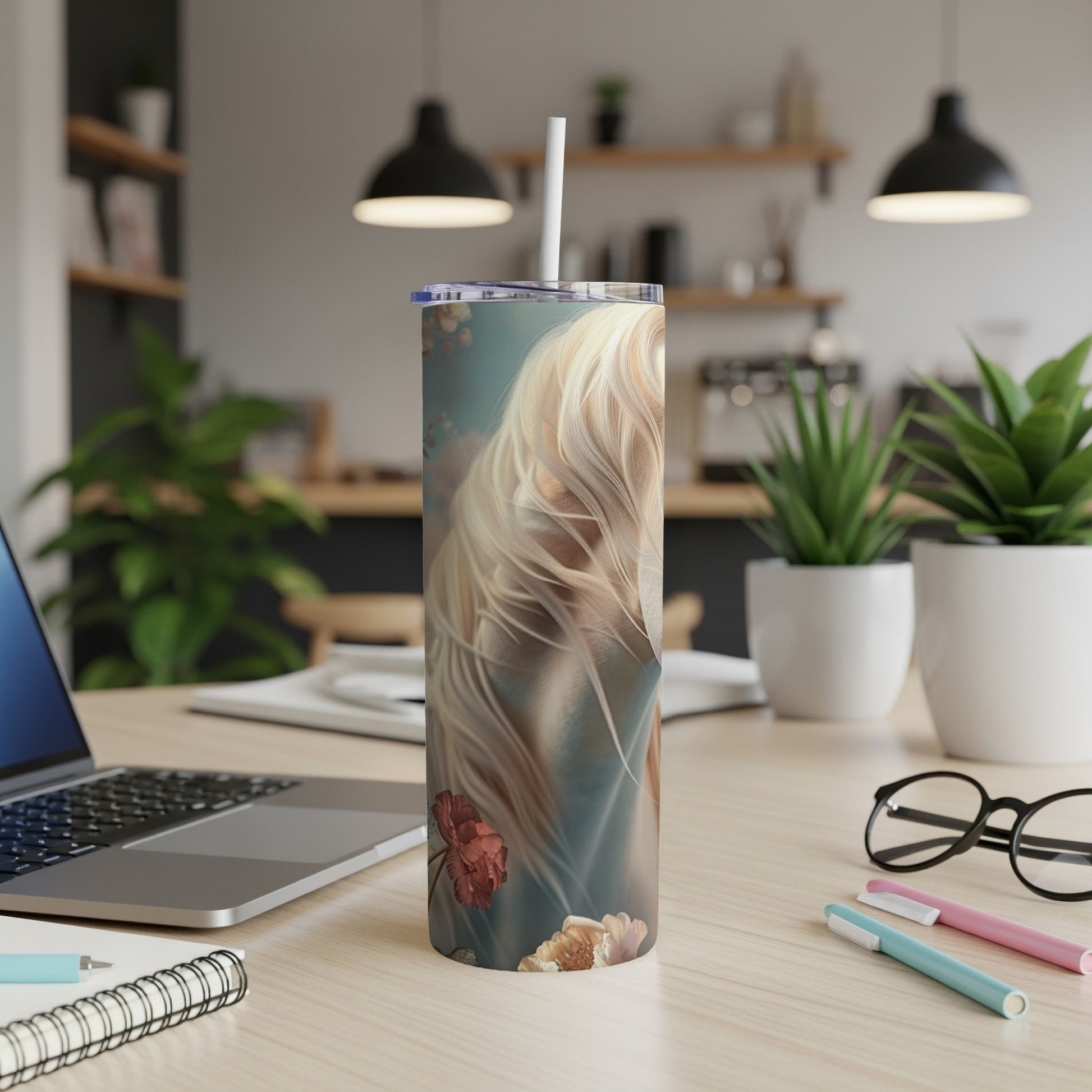White horse with flowing mane and floral accents on a tumbler.