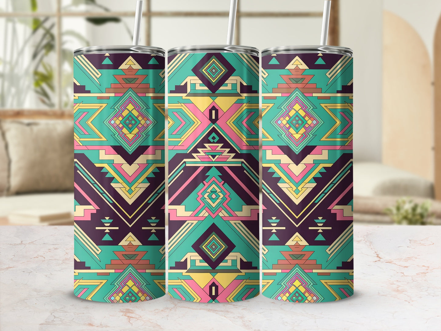 Three tumblers with geometric teal, pink, and yellow Southwestern patterns.