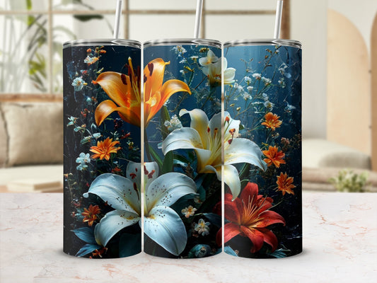 Three tumblers with realistic lily and floral designs against a blurred background.