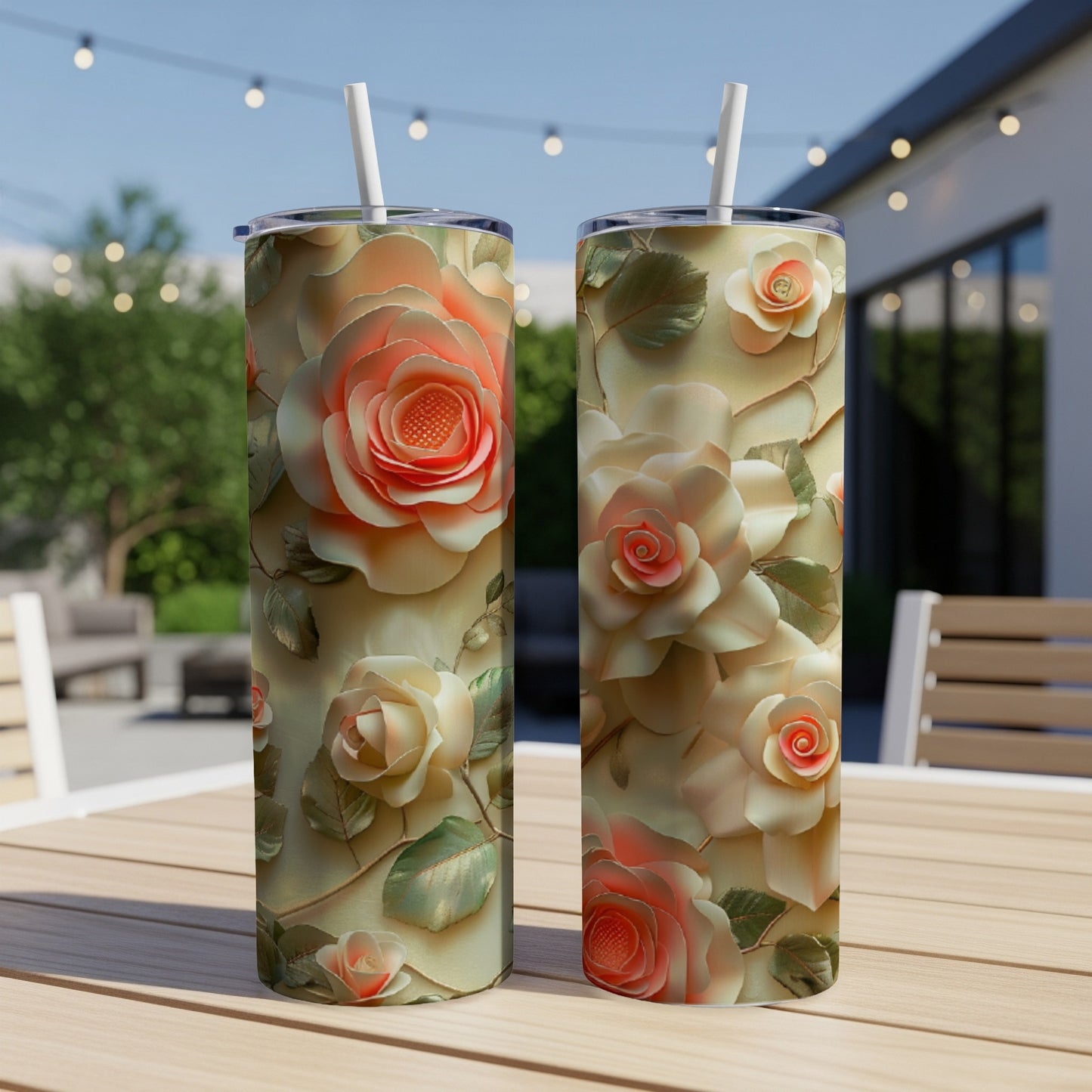 Two tall tumblers with a 3D rose design on a wooden table.
