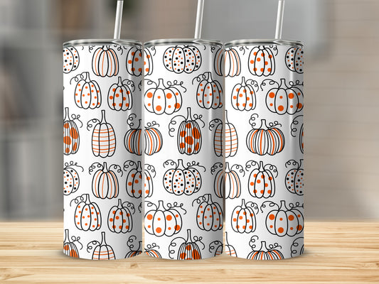 Seamless pattern of hand-drawn pumpkins with stripes and polka dots on white background.
