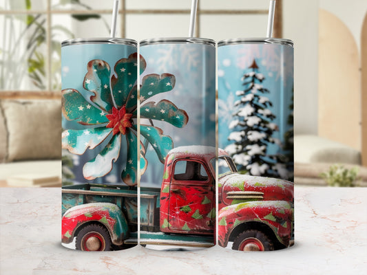 Tumbling tumbler with vintage red truck and snowy Christmas tree design.
