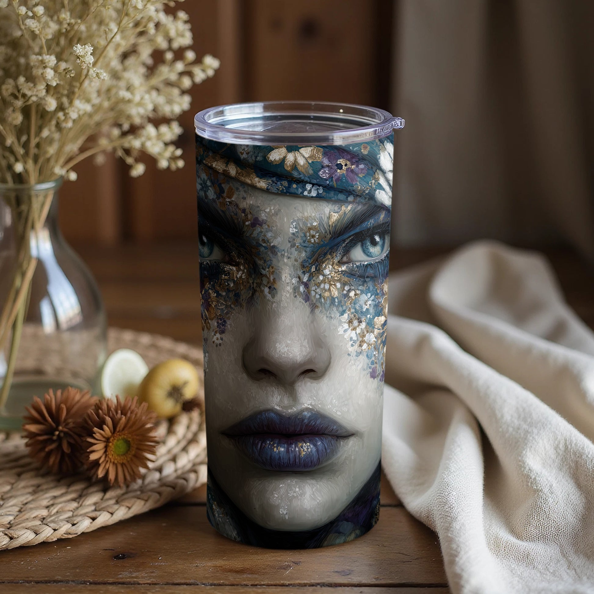 Artistic Face Design Tumbler With Floral Accents