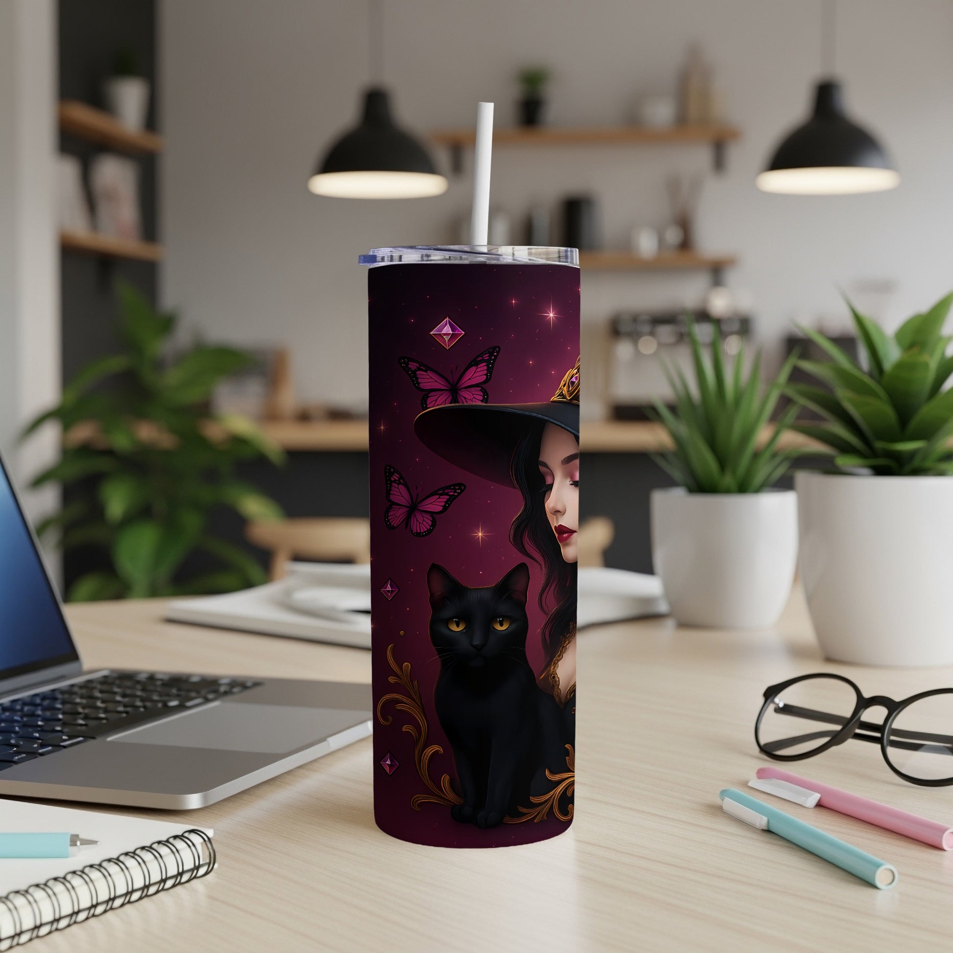 Tumbler with witch, black cat, pink butterflies, and gems on a dark purple background.