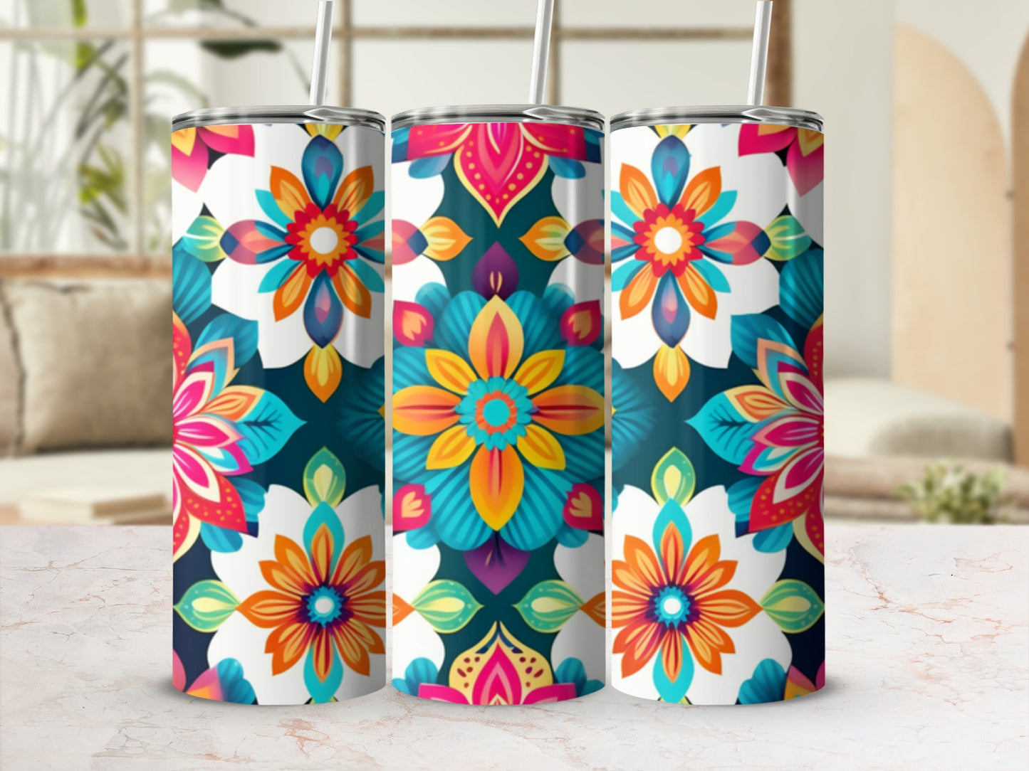 Three tumblers with a colorful floral mandala design.
