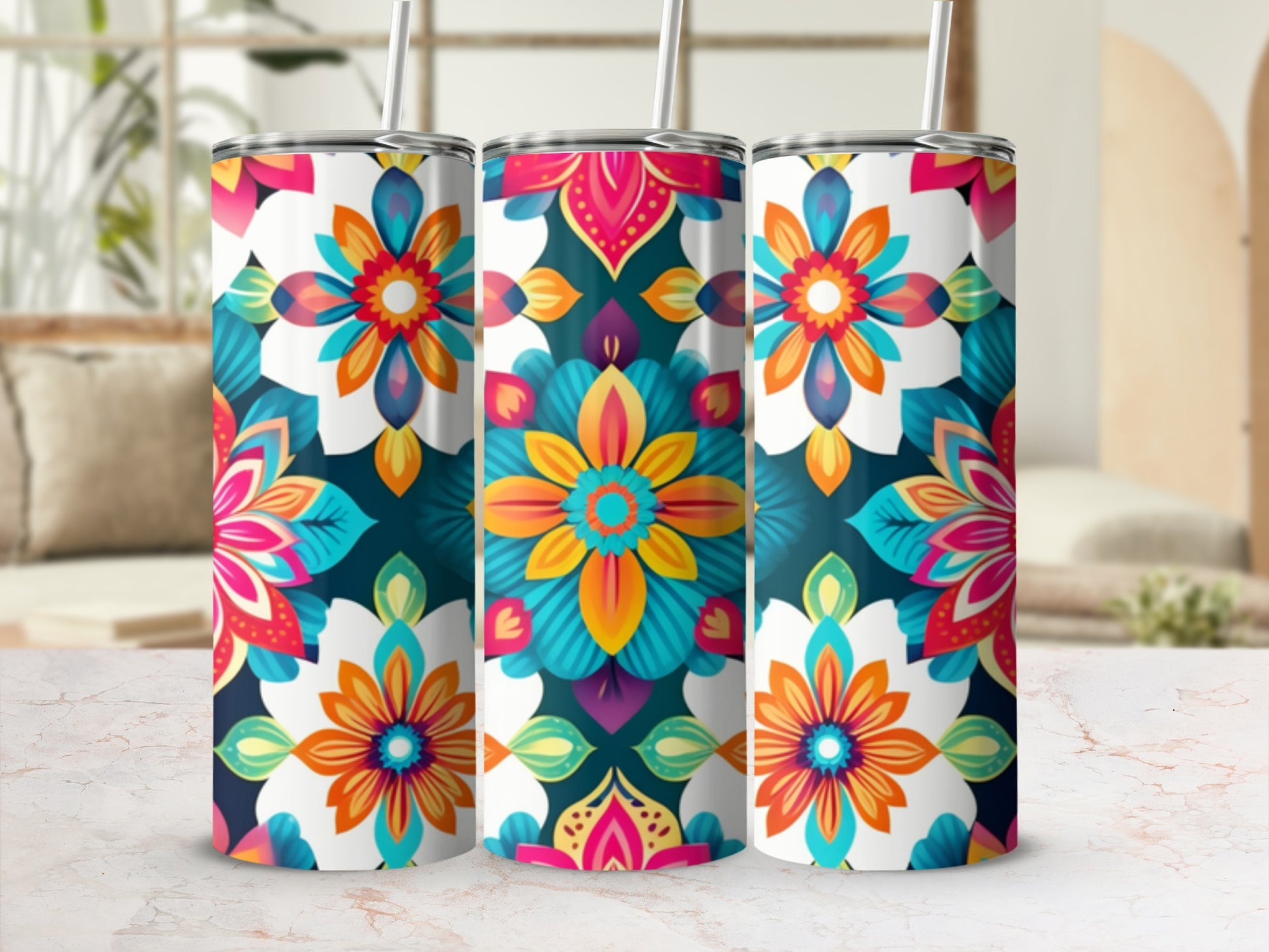 Three tumblers with a colorful floral mandala design.