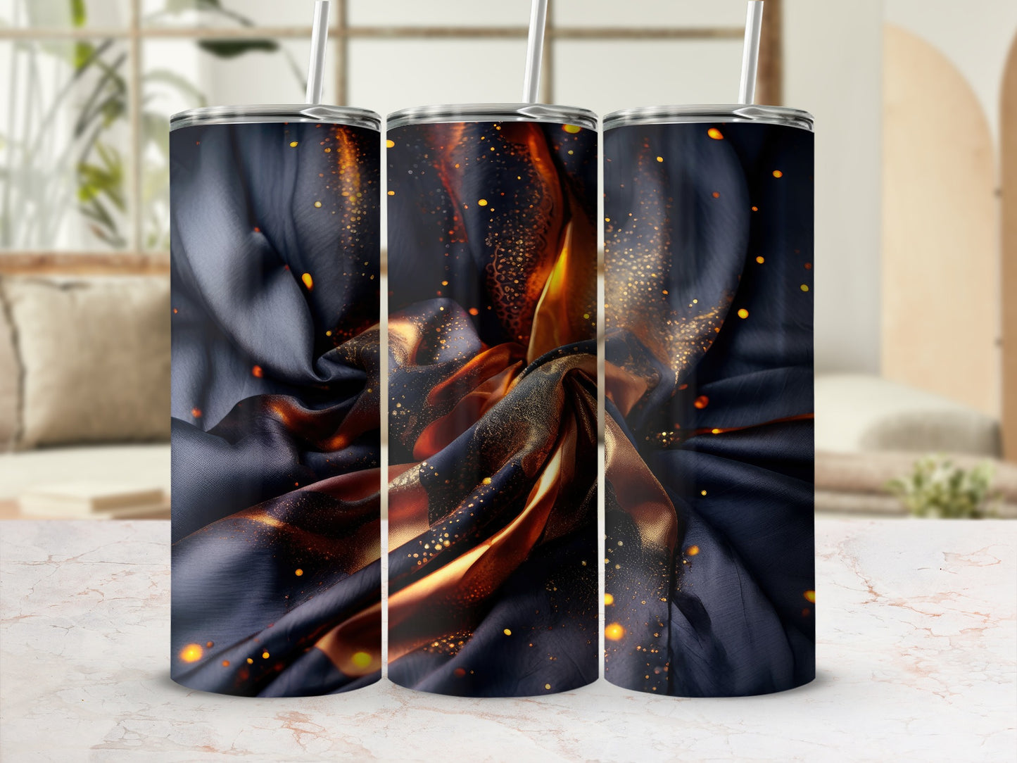 Three tumblers with swirling dark fabric and gold glitter design.