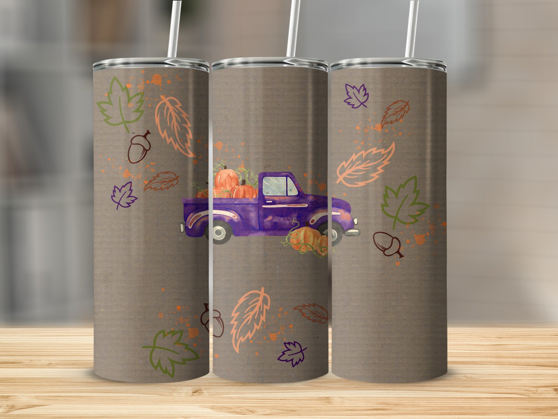 Purple truck with pumpkins and fall leaves pattern on tumblers.