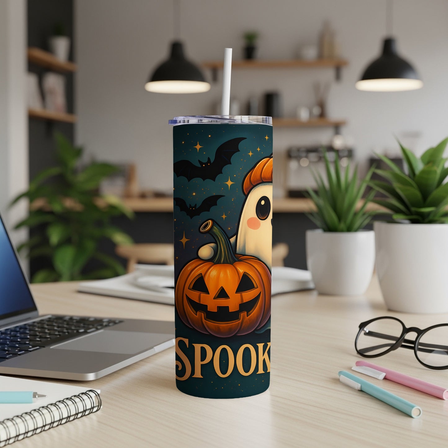 Halloween tumbler with ghost, pumpkin, bats, stars, and "SPOOKY" text.