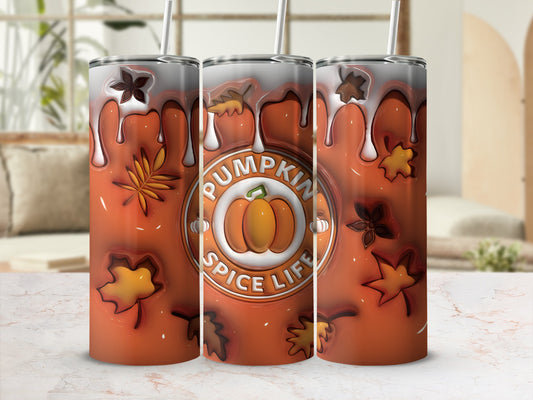 Orange tumbler with pumpkin spice life graphic and autumn leaves.