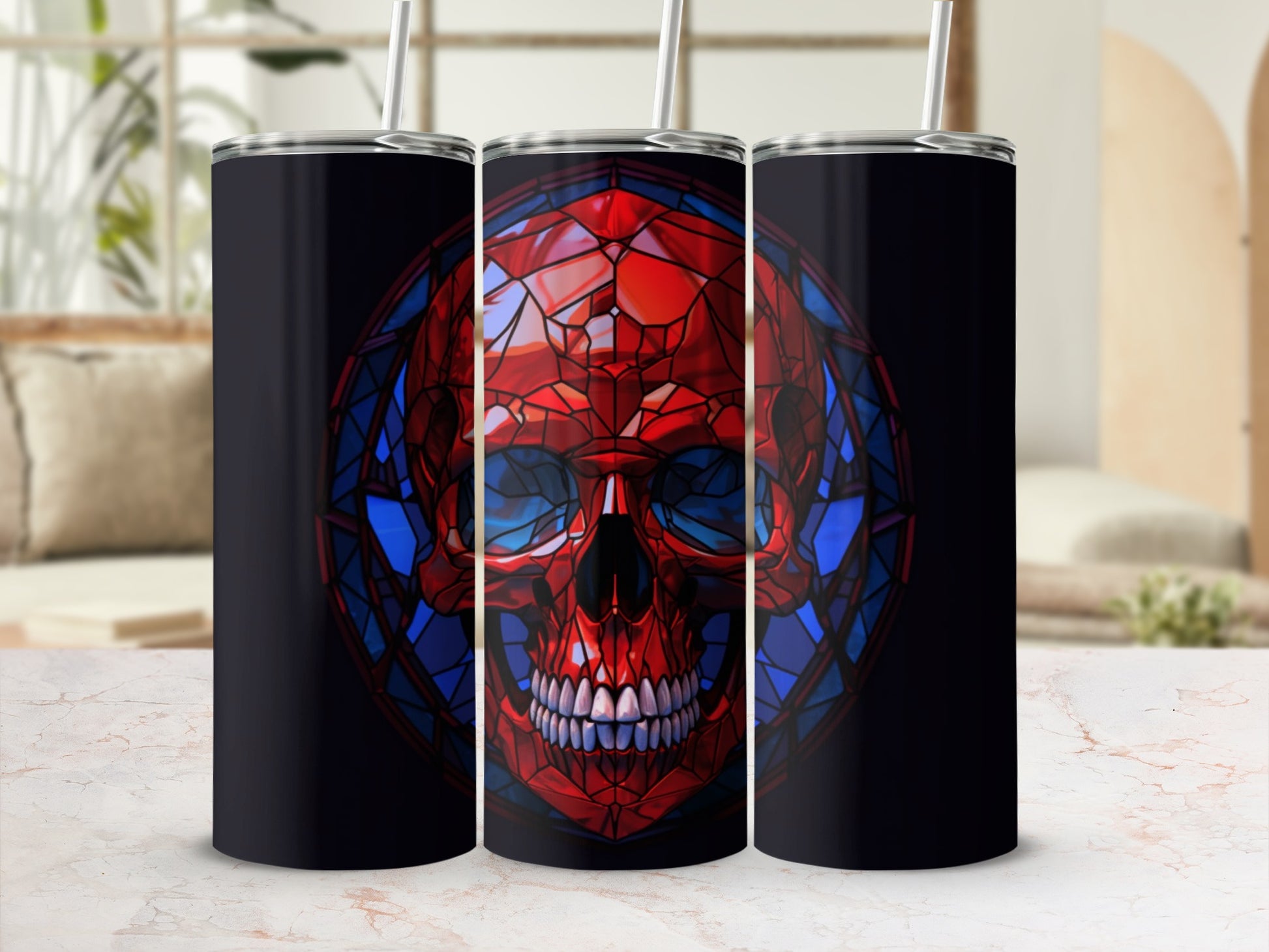 Three black tumblers with a red and blue stained-glass skull design.
