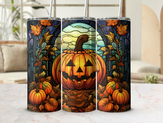 Triptych of stained glass pumpkin designs with fall leaves and autumn harvest motifs.