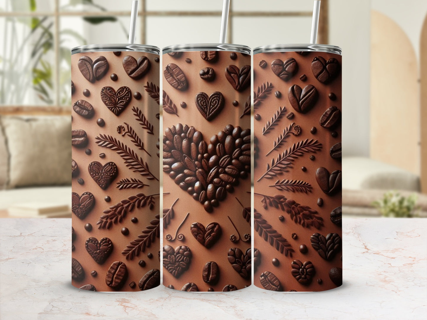 Three brown coffee bean and heart pattern tumblers with straws.