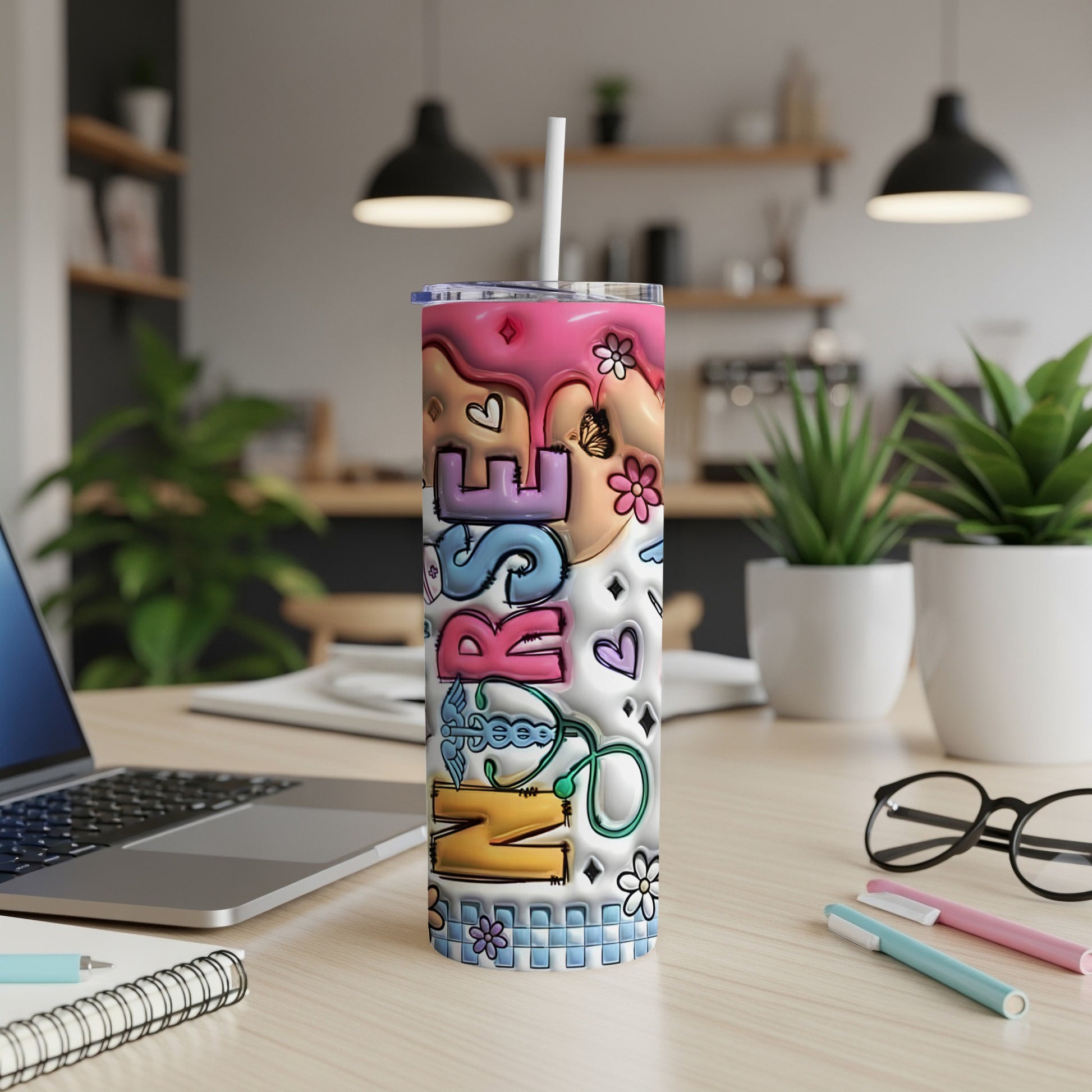 "NURSE" text on a pink and blue abstract design tumbler with stethoscope and butterflies.