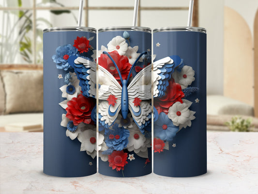 Blue tumbler with white butterfly and red, white, and blue floral design.