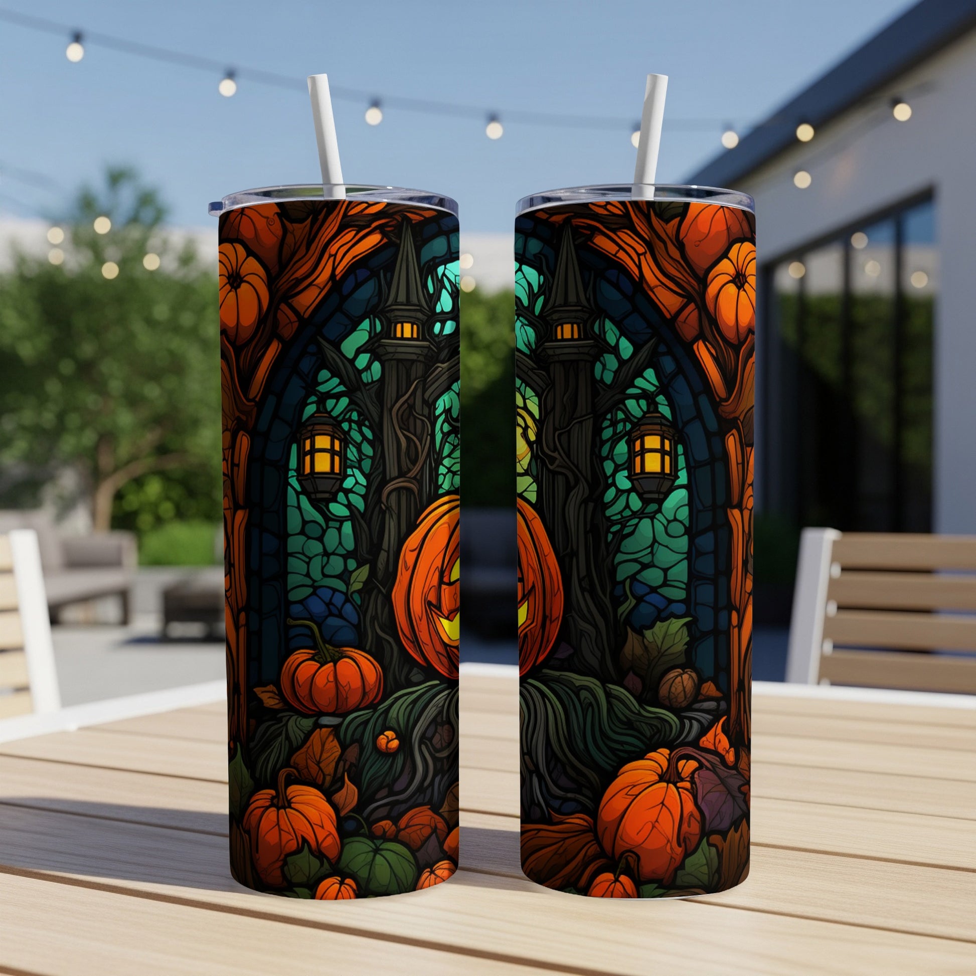 Halloween tumbler with pumpkins, a spooky tree, and castle design.