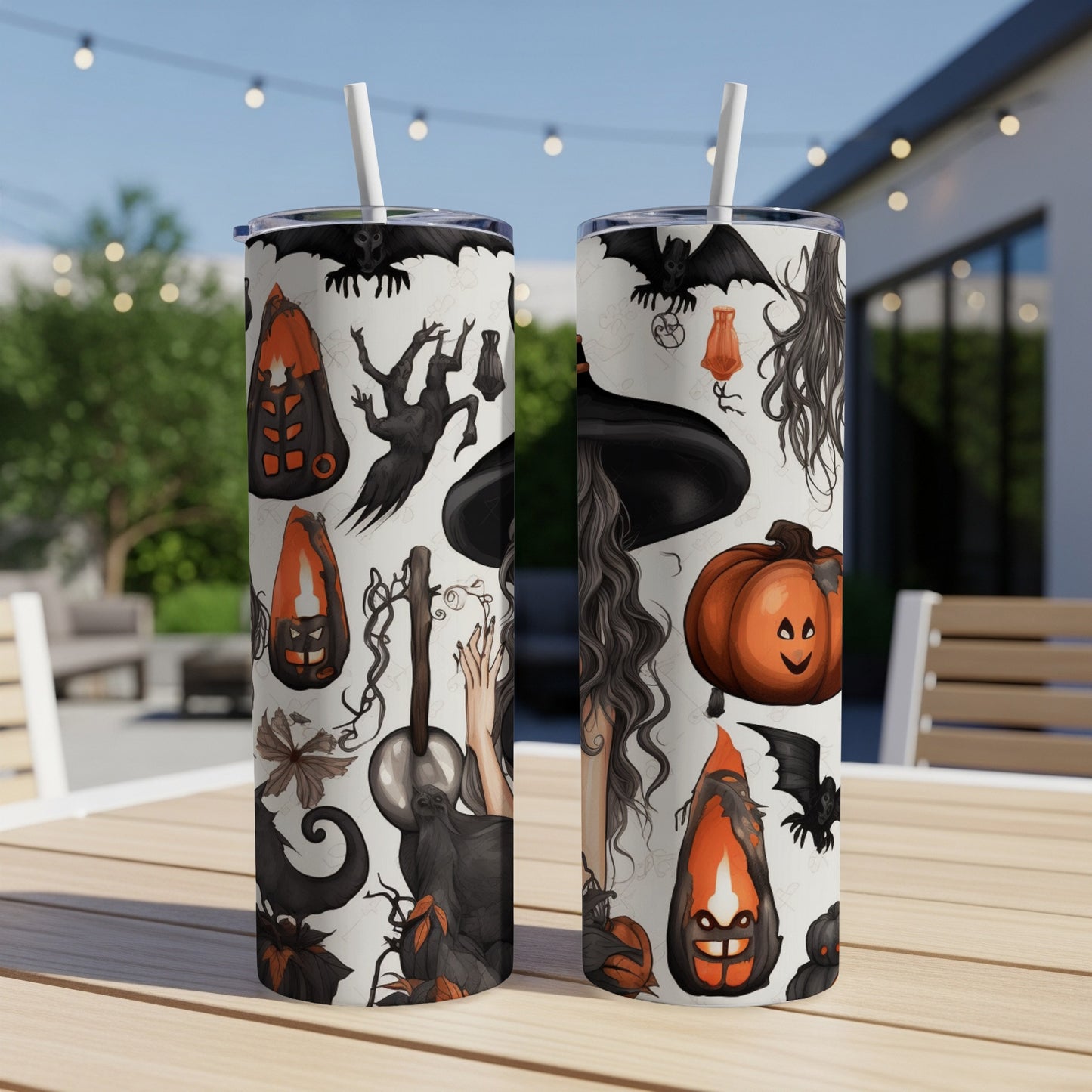 Two tumblers with a Halloween pattern featuring bats, pumpkins, witches, and spooky trees.