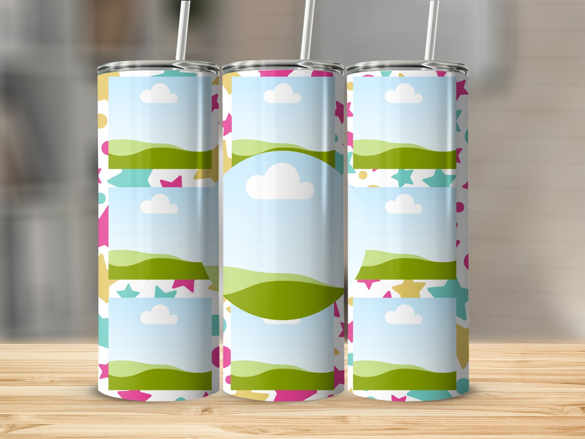 Three tumblers with repeating photo frames, clouds, and colorful stars on a wooden surface.