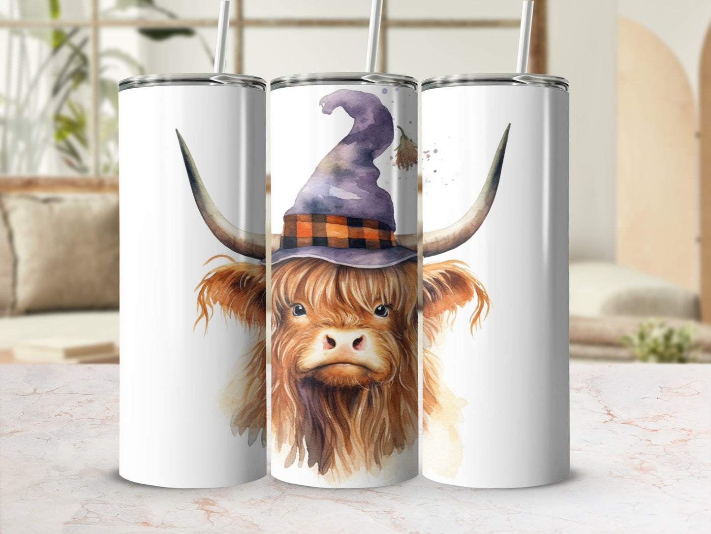 Highland cow wearing witch hat on a white tumbler.