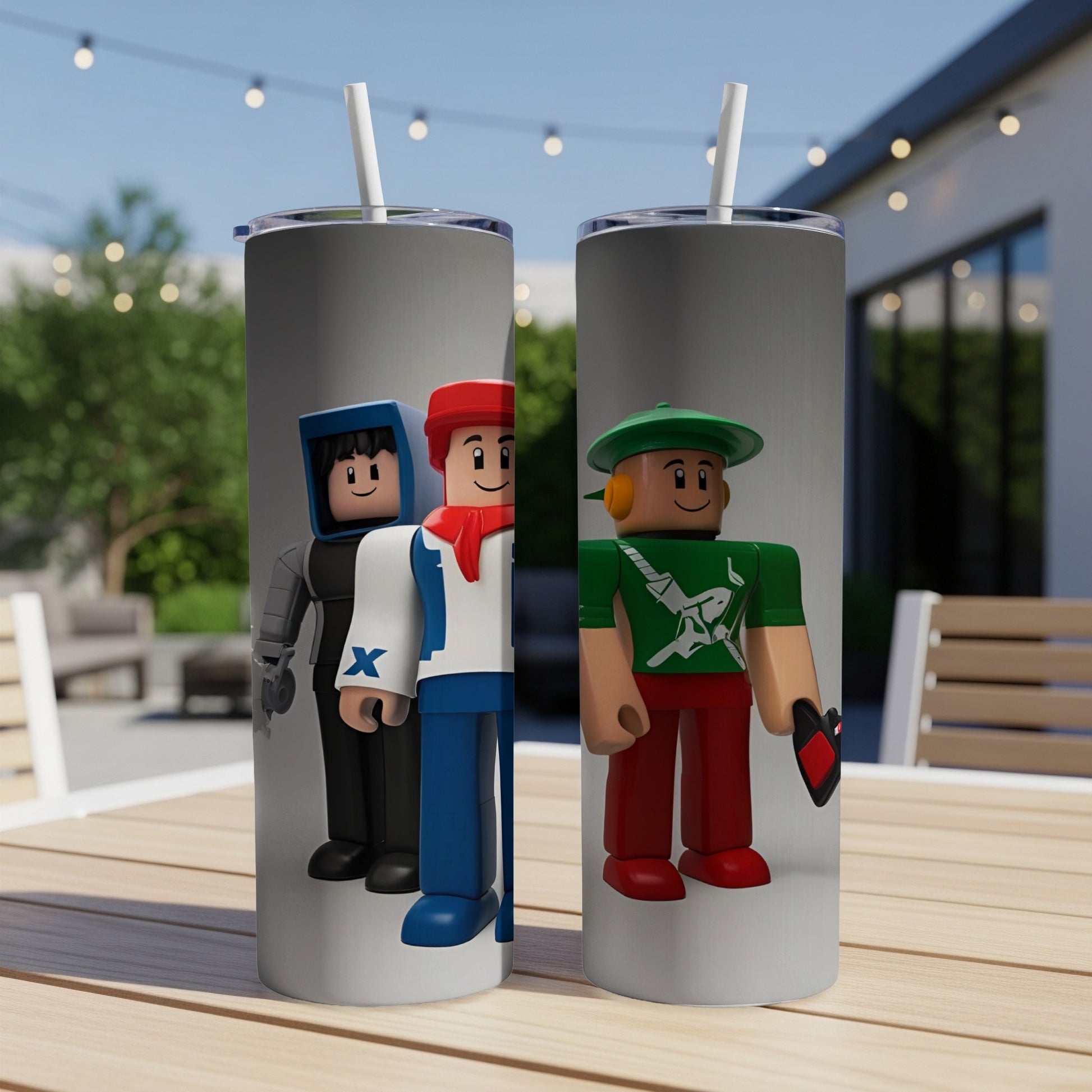 Two tall tumblers featuring Roblox characters on a table.