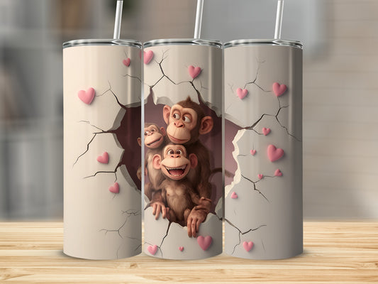 Three tumblers with monkeys peeking through cracked hearts.