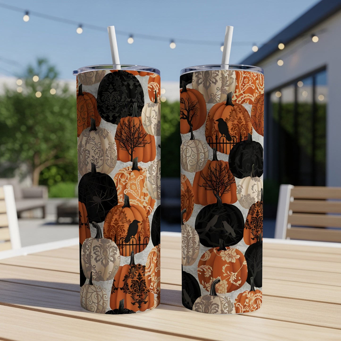 Two tumblers with Halloween pumpkin and damask patterns.