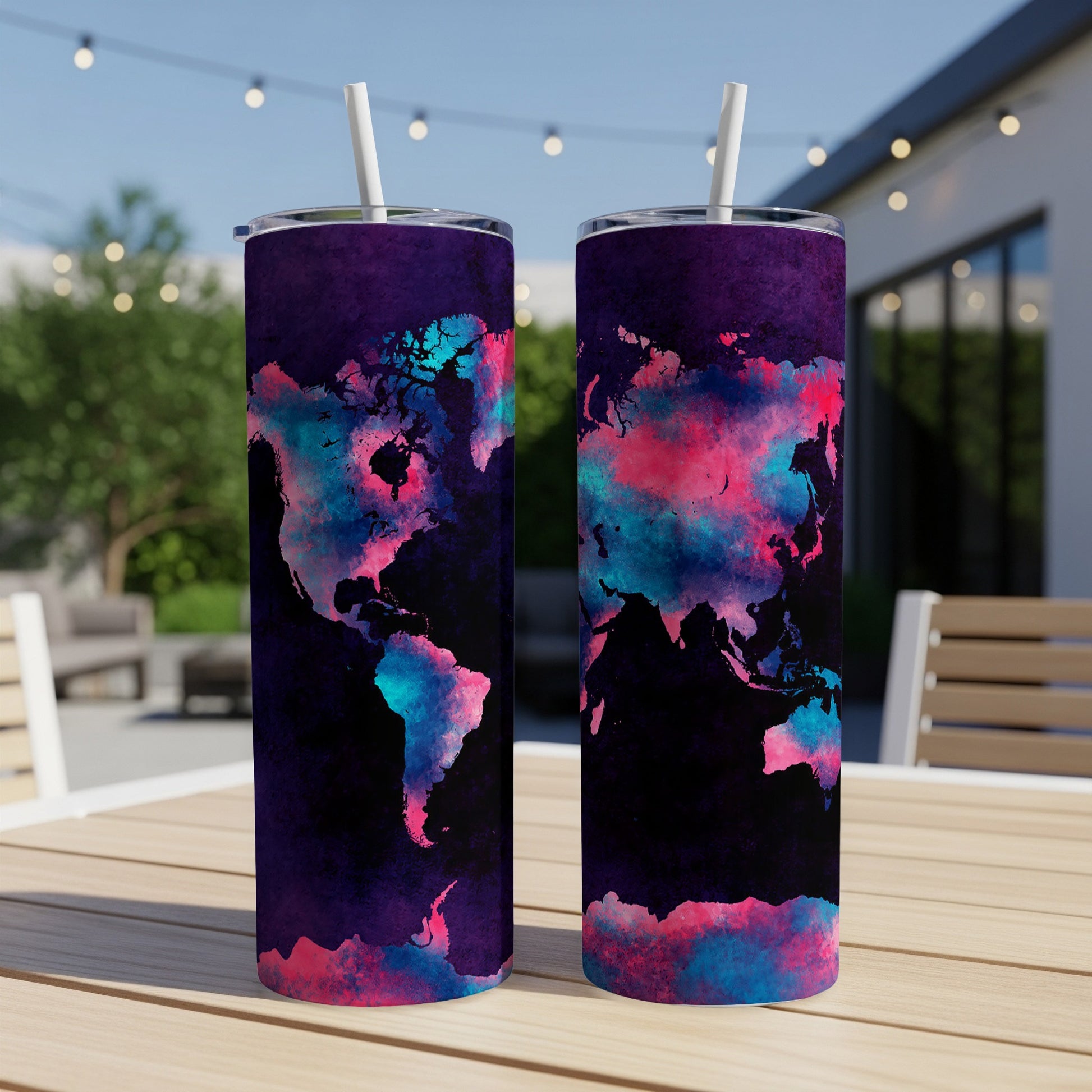 Two tumblers with world map design in vibrant pink and blue watercolor on black background.