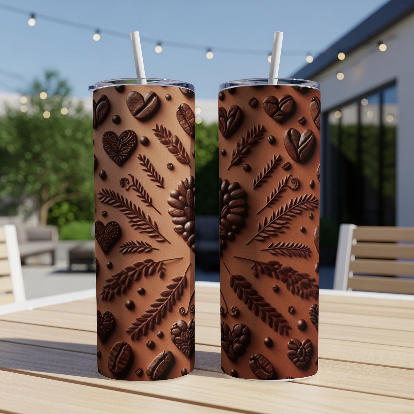 Two tall, insulated tumblers with a brown embossed pattern of coffee beans and leaves.