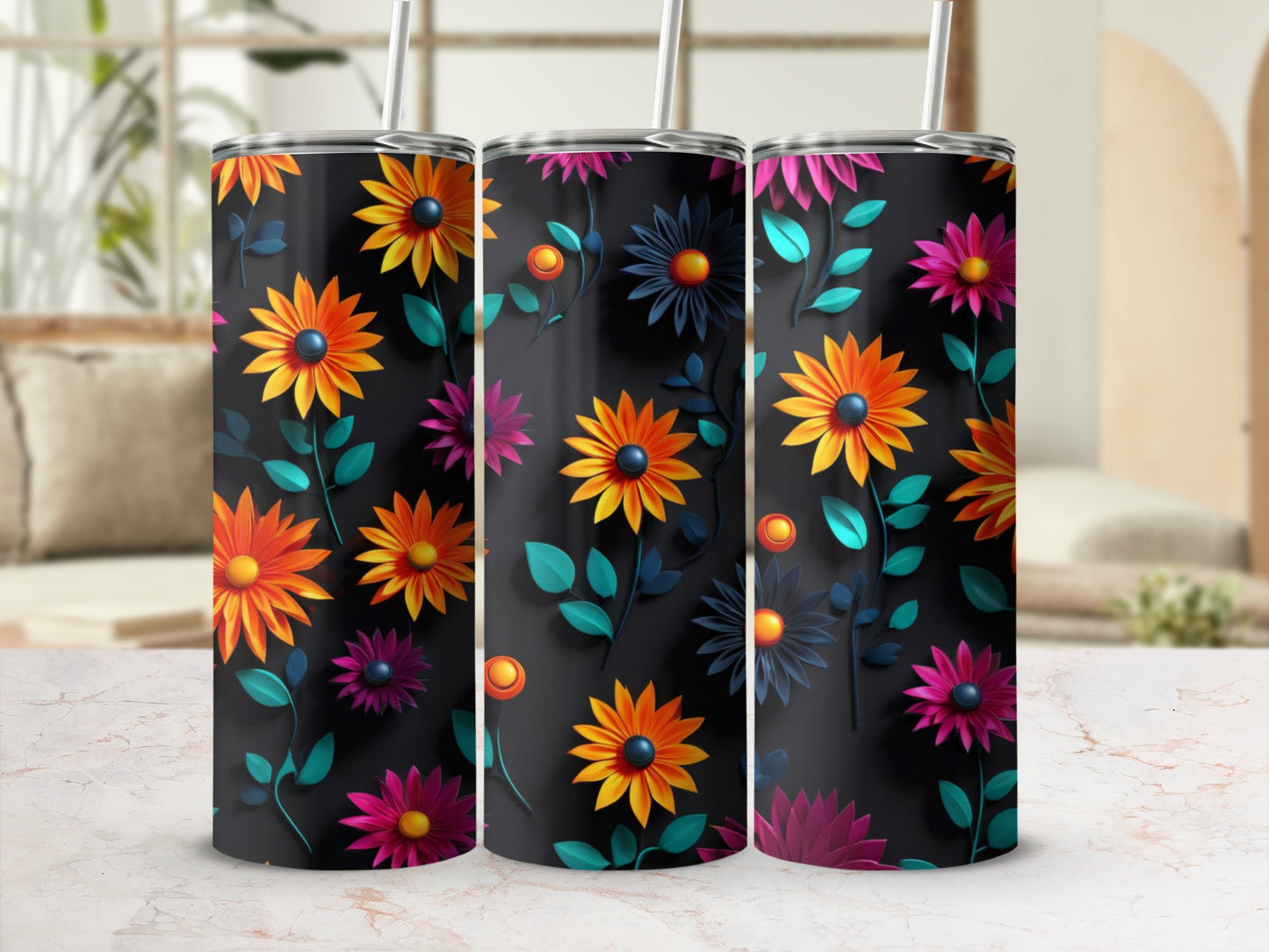 Three tumblers with colorful floral patterns on a dark background.