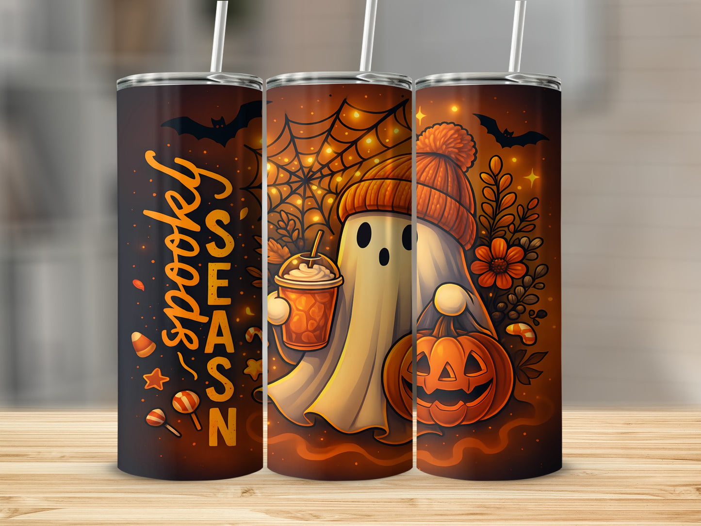 Halloween tumblers with spooky ghost, pumpkin, spiderwebs, and "spooky season" text.