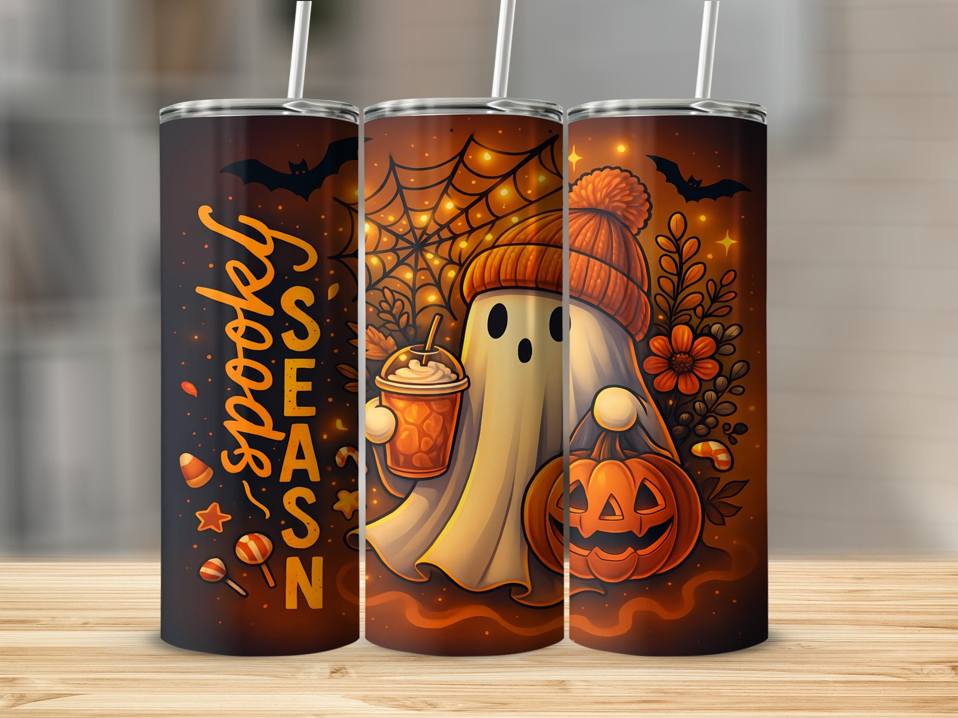 Halloween tumblers with spooky ghost, pumpkin, spiderwebs, and "spooky season" text.