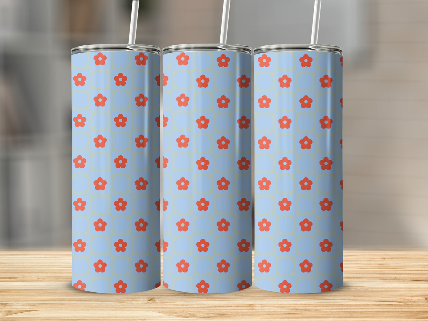 Three tumblers with a blue background and red floral pattern.