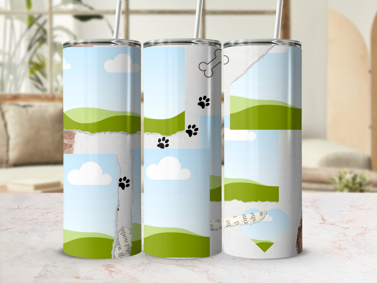 Three tumblers with a landscape design, paw prints, and torn paper accents.